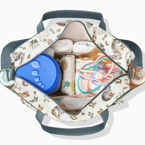 Bolsa de maternidade azul claro com coelhos